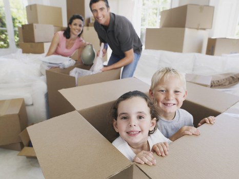 Packed moving boxes ready for a Greenwich home relocation