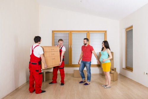 Organized storage boxes and furniture in a Greenwich storage facility