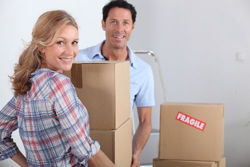 Local small removals team preparing items for transport