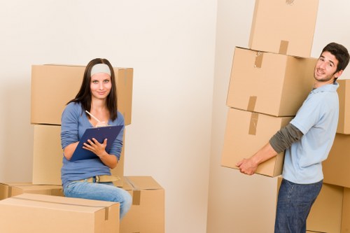 Home removal team handling furniture during a Greenwich relocation